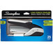 A Swingline QuickTouch stapler in a box with black and silver accents.