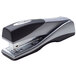 A Swingline stapler with a black handle and silver body.