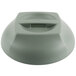A grey plastic dome lid with a handle on a white object.