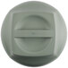 A top view of a white Cambro insulated plastic plate cover with a gray button.