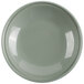 A white insulated plastic plate cover with a green meadow design.