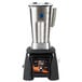 A Waring X-Prep commercial blender with a silver container and black and silver base.
