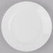 A Libbey Porcelana white porcelain plate with a wide white rim.