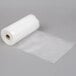 A roll of ARY VacMaster full mesh vacuum packaging bags on a white surface.
