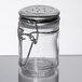 A Tablecraft glass jar with a stainless steel clip-top lid.
