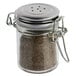 A Tablecraft glass salt and pepper shaker with a stainless steel clip-top lid.