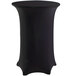 A black Snap Drape spandex table cover with a round top on a cocktail bar.