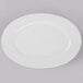 A white Libbey porcelain platter with a wide rim.