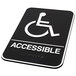 A black and white sign with the word "Accessible" and a wheelchair symbol in white.