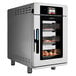 An Alto-Shaam Vector H Series multi-cook oven with stainless steel and food inside.