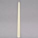 A case of 144 ivory Hyoola taper candles with a long stem.