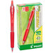 The red barrel of a Pilot Precise Gel retractable pen with red ink.