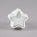 A white Ateco plastic star pastry cutter set.