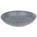 A grey and white speckled stoneware bowl.