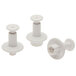 Three white plastic Ateco Clover plunger cutters.