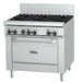A large stainless steel Garland gas range with six burners and a white oven.