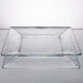 A clear square glass Libbey tempo plate on a white surface.