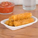 A Huhtamaki Chinet rectangular paper food tray with fried chicken strips.