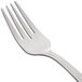 A 10 Strawberry Street stainless steel salad fork with a white handle.