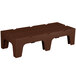 A brown plastic bench with slotted top legs.