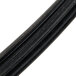 A close up of a black rubber tube with ridges.