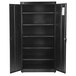 A black metal HON storage cabinet with shelves inside.