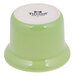 A green ceramic Tuxton Petite Marmite with a white lid.