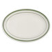 A white oval Tuxton china platter with green bands.