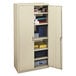 A tan metal Hon Brigade storage cabinet with shelves.