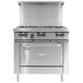 A stainless steel Garland commercial gas range with 2 burners, a griddle, and an oven.