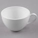 A white Libbey porcelain low cup with a handle.