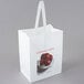 A white Choice paper bag with a picture of apples on it.
