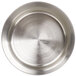 A close-up of a stainless steel circular rum baba mold.