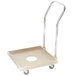 A beige Vollrath dish rack dolly with a chrome-plated handle and swivel casters.