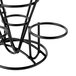 A black metal Clipper Mill cone basket with 3 round ramekin holders.