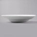 A Libbey Basics bright white porcelain entree/pasta bowl on a white surface.