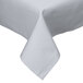 A gray hemmed Intedge square tablecloth on a table.