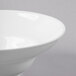 A close-up of a Libbey Ultra Bright White Sea Bright Bowl with a small rim.