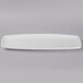 A white rectangular Libbey porcelain tray with long edges.