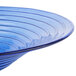An American Metalcraft Glacier Blue glass bowl with a spiral design on it.