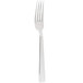 A silver Bon Chef Roman dinner fork with a white background.