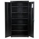 A black metal HON storage cabinet with shelves and doors open.