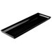 A black rectangular cast aluminum platter with a flared white handle.