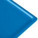 A close-up of a blue Tablecraft rectangular cooling platter.