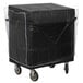 A black plastic covered Cambro tray and flatware cart on wheels.