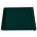 A hunter green rectangular cast aluminum cooling platter with a white speckled border.