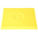 A yellow Tablecraft cast aluminum rectangular cooling platter.