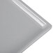 A Tablecraft natural cast aluminum half long rectangular cooling platter.