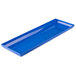 A cobalt blue rectangular cast aluminum tray with a handle.