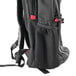 A black backpack with a red stripe and a zipper.
